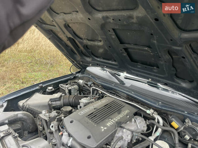 Серый Мицубиси Паджеро, объемом двигателя 3 л и пробегом 290 тыс. км за 9000 $, фото 24 на Automoto.ua