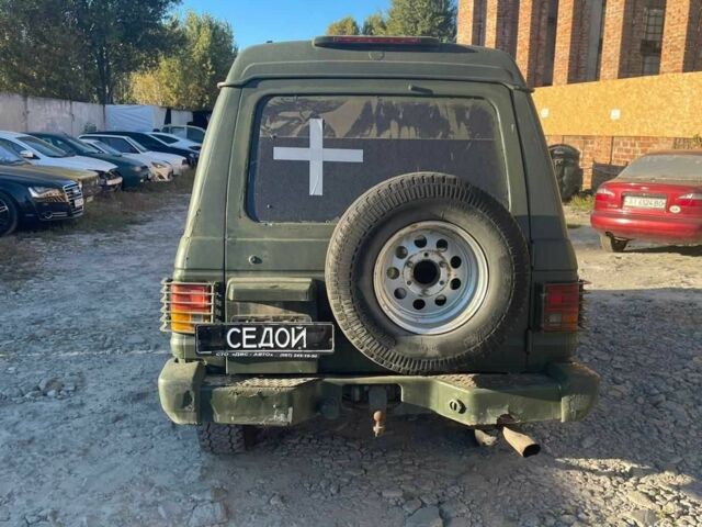 Синий Мицубиси Паджеро, объемом двигателя 2.6 л и пробегом 300 тыс. км за 1500 $, фото 2 на Automoto.ua