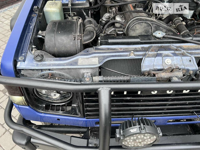 Синій Міцубісі Паджеро, об'ємом двигуна 2.48 л та пробігом 200 тис. км за 8800 $, фото 25 на Automoto.ua