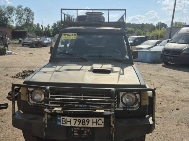 Синий Мицубиси Паджеро, объемом двигателя 2.6 л и пробегом 250 тыс. км за 5230 $, фото 2 на Automoto.ua