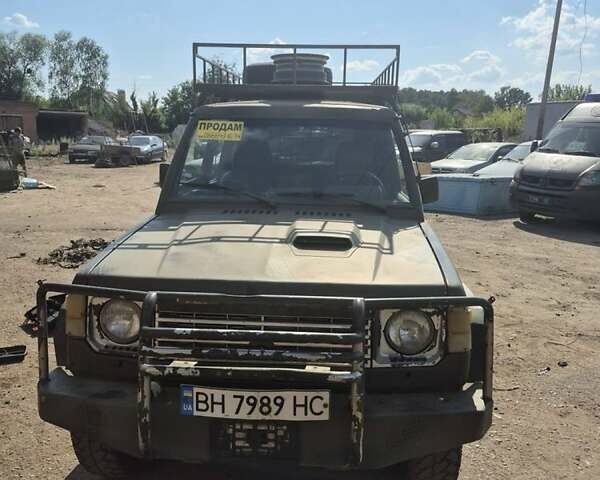 Синий Мицубиси Паджеро, объемом двигателя 2.6 л и пробегом 250 тыс. км за 5230 $, фото 1 на Automoto.ua