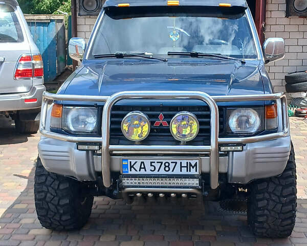 Синій Міцубісі Паджеро, об'ємом двигуна 2.5 л та пробігом 475 тис. км за 7500 $, фото 11 на Automoto.ua