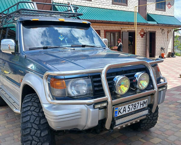 Синій Міцубісі Паджеро, об'ємом двигуна 2.5 л та пробігом 475 тис. км за 7500 $, фото 13 на Automoto.ua