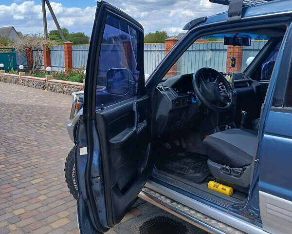 Синій Міцубісі Паджеро, об'ємом двигуна 2.5 л та пробігом 475 тис. км за 7500 $, фото 15 на Automoto.ua
