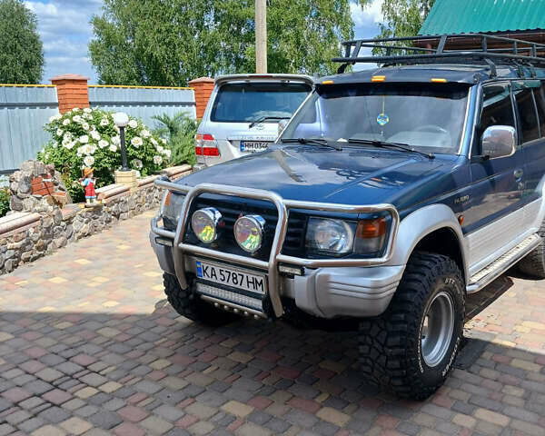 Синій Міцубісі Паджеро, об'ємом двигуна 2.5 л та пробігом 475 тис. км за 7500 $, фото 12 на Automoto.ua