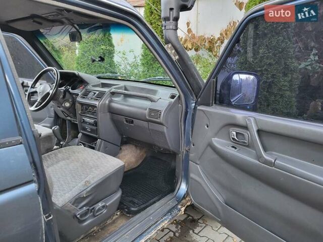 Синий Мицубиси Паджеро, объемом двигателя 2.48 л и пробегом 100 тыс. км за 6000 $, фото 8 на Automoto.ua