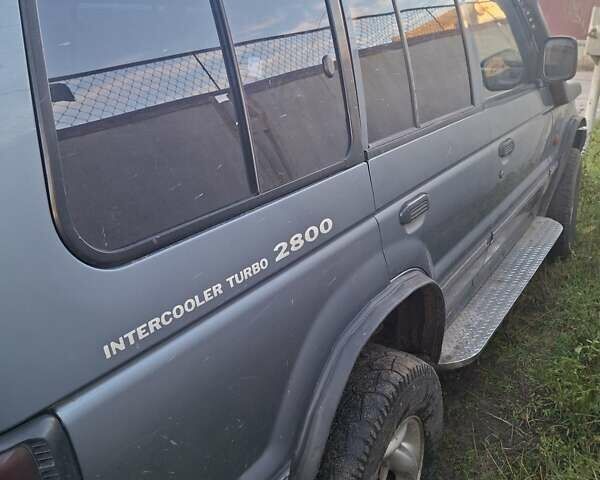 Синій Міцубісі Паджеро, об'ємом двигуна 2.8 л та пробігом 395 тис. км за 5700 $, фото 7 на Automoto.ua