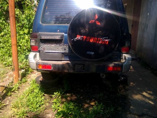 Синий Мицубиси Паджеро, объемом двигателя 3 л и пробегом 200 тыс. км за 4000 $, фото 1 на Automoto.ua