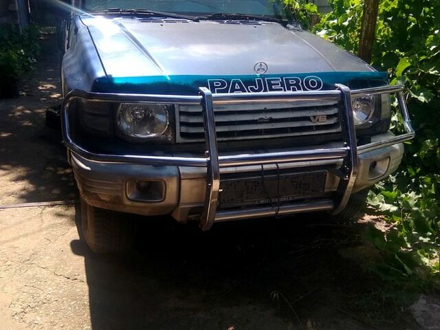 Синий Мицубиси Паджеро, объемом двигателя 3 л и пробегом 200 тыс. км за 4000 $, фото 2 на Automoto.ua