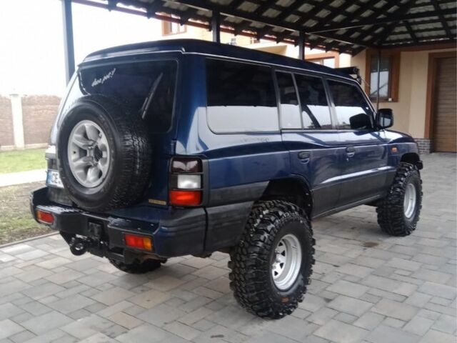 Синій Міцубісі Паджеро, об'ємом двигуна 3.5 л та пробігом 300 тис. км за 12000 $, фото 10 на Automoto.ua