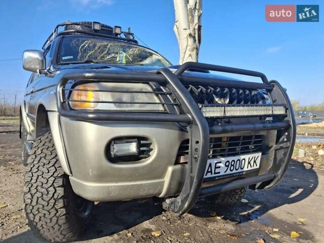 Синий Мицубиси Паджеро, объемом двигателя 2.48 л и пробегом 380 тыс. км за 7999 $, фото 4 на Automoto.ua
