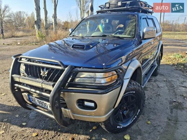 Синий Мицубиси Паджеро, объемом двигателя 2.48 л и пробегом 380 тыс. км за 7999 $, фото 2 на Automoto.ua