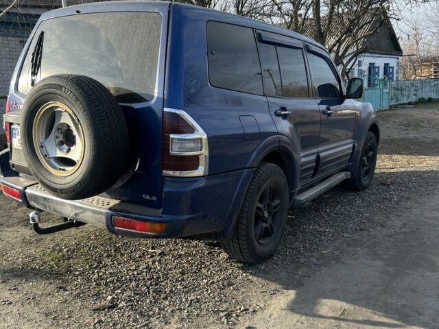 Синий Мицубиси Паджеро, объемом двигателя 3.5 л и пробегом 257 тыс. км за 5998 $, фото 6 на Automoto.ua
