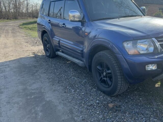 Синий Мицубиси Паджеро, объемом двигателя 3.5 л и пробегом 257 тыс. км за 6000 $, фото 2 на Automoto.ua