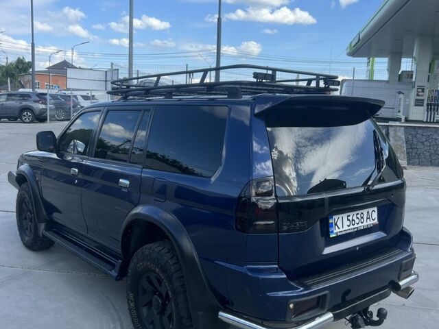 Синій Міцубісі Паджеро, об'ємом двигуна 3 л та пробігом 400 тис. км за 6700 $, фото 5 на Automoto.ua