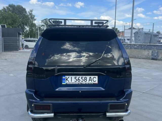 Синій Міцубісі Паджеро, об'ємом двигуна 3 л та пробігом 400 тис. км за 6700 $, фото 7 на Automoto.ua