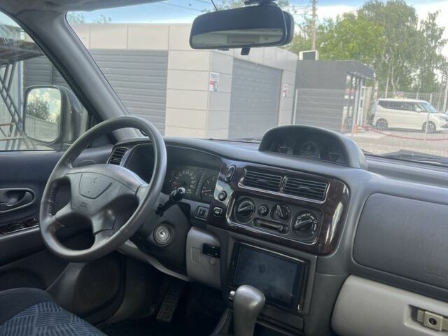 Синій Міцубісі Паджеро, об'ємом двигуна 3 л та пробігом 400 тис. км за 6700 $, фото 11 на Automoto.ua