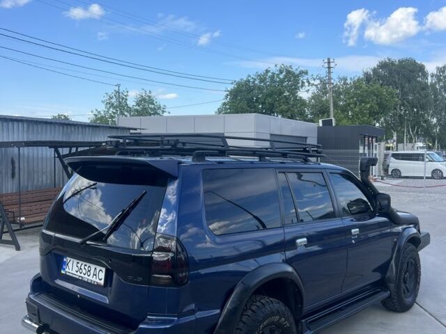 Синій Міцубісі Паджеро, об'ємом двигуна 3 л та пробігом 400 тис. км за 6700 $, фото 8 на Automoto.ua