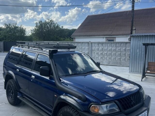 Синій Міцубісі Паджеро, об'ємом двигуна 3 л та пробігом 400 тис. км за 6700 $, фото 2 на Automoto.ua