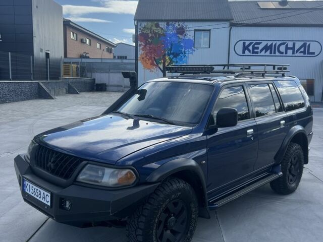 Синій Міцубісі Паджеро, об'ємом двигуна 3 л та пробігом 400 тис. км за 6700 $, фото 3 на Automoto.ua