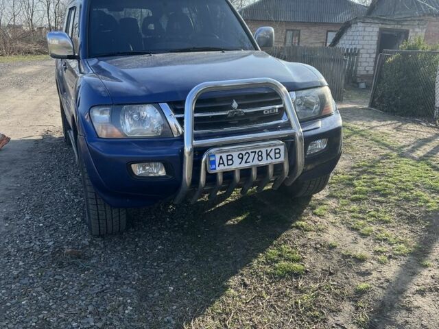Синий Мицубиси Паджеро, объемом двигателя 3.5 л и пробегом 257 тыс. км за 6000 $, фото 1 на Automoto.ua