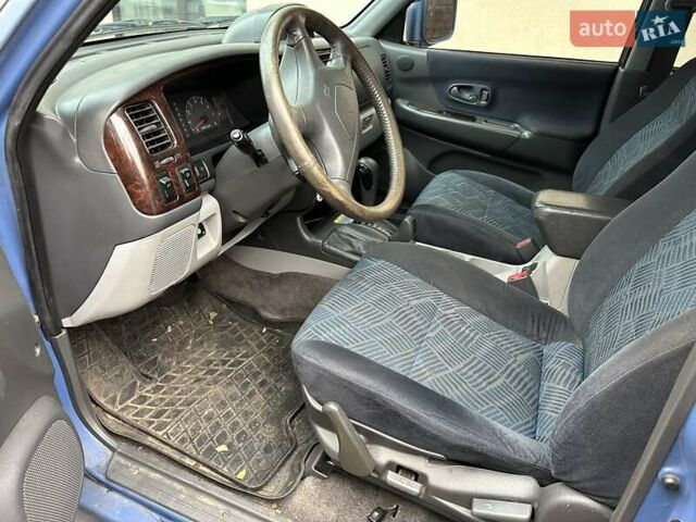 Синий Мицубиси Паджеро, объемом двигателя 3 л и пробегом 332 тыс. км за 6200 $, фото 4 на Automoto.ua