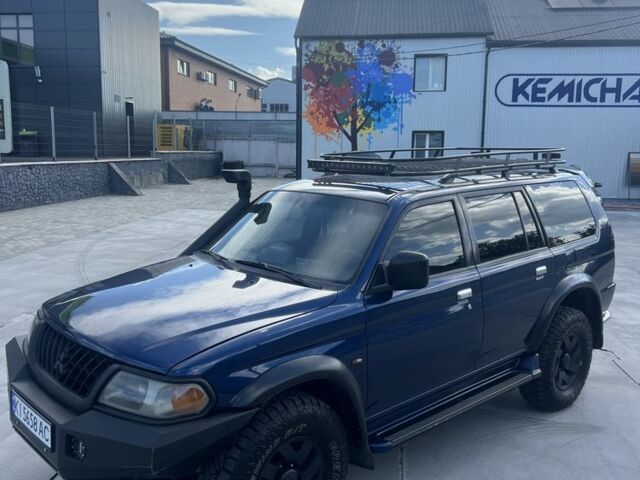 Синій Міцубісі Паджеро, об'ємом двигуна 3 л та пробігом 400 тис. км за 6700 $, фото 4 на Automoto.ua