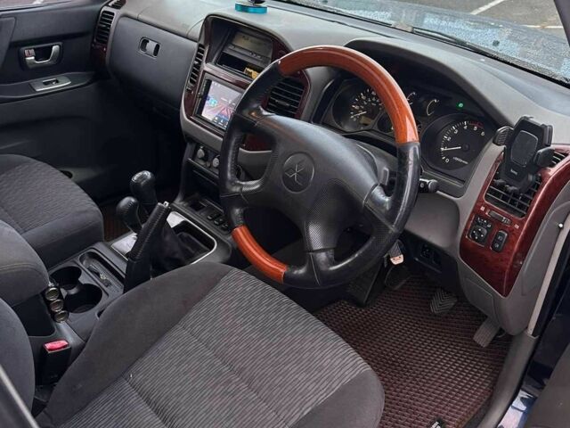 Синий Мицубиси Паджеро, объемом двигателя 3.2 л и пробегом 133 тыс. км за 5000 $, фото 2 на Automoto.ua