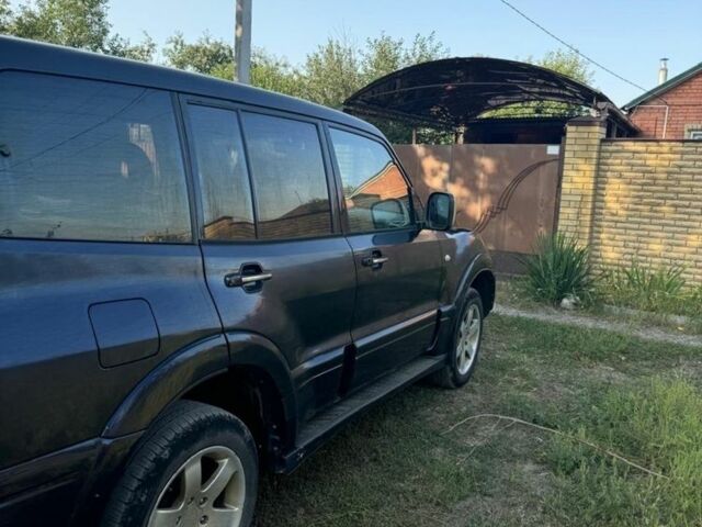 Синий Мицубиси Паджеро, объемом двигателя 3.2 л и пробегом 400 тыс. км за 5800 $, фото 1 на Automoto.ua