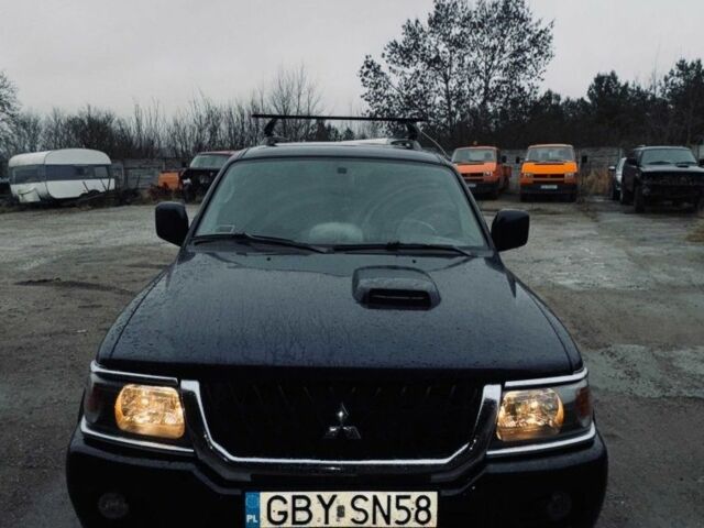 Синий Мицубиси Паджеро, объемом двигателя 2.5 л и пробегом 250 тыс. км за 2450 $, фото 1 на Automoto.ua