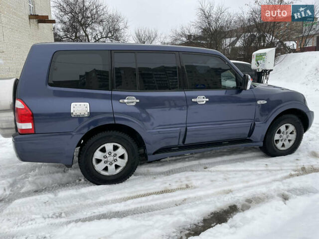 Синій Міцубісі Паджеро, об'ємом двигуна 3 л та пробігом 295 тис. км за 8500 $, фото 16 на Automoto.ua