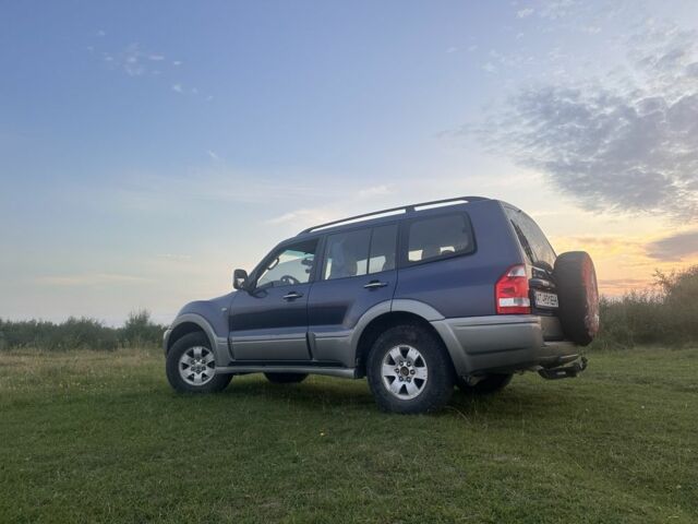 Синий Мицубиси Паджеро, объемом двигателя 3 л и пробегом 180 тыс. км за 6500 $, фото 3 на Automoto.ua