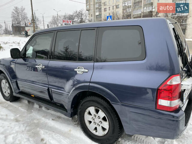 Синій Міцубісі Паджеро, об'ємом двигуна 3 л та пробігом 295 тис. км за 8500 $, фото 21 на Automoto.ua