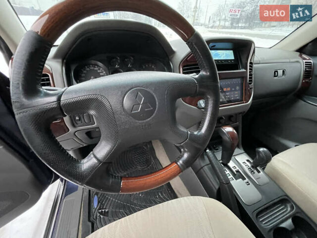 Синій Міцубісі Паджеро, об'ємом двигуна 3 л та пробігом 295 тис. км за 8500 $, фото 23 на Automoto.ua