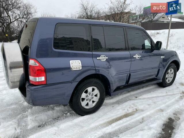 Синій Міцубісі Паджеро, об'ємом двигуна 3 л та пробігом 295 тис. км за 8500 $, фото 10 на Automoto.ua