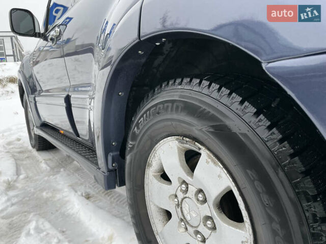Синій Міцубісі Паджеро, об'ємом двигуна 3 л та пробігом 295 тис. км за 8500 $, фото 19 на Automoto.ua