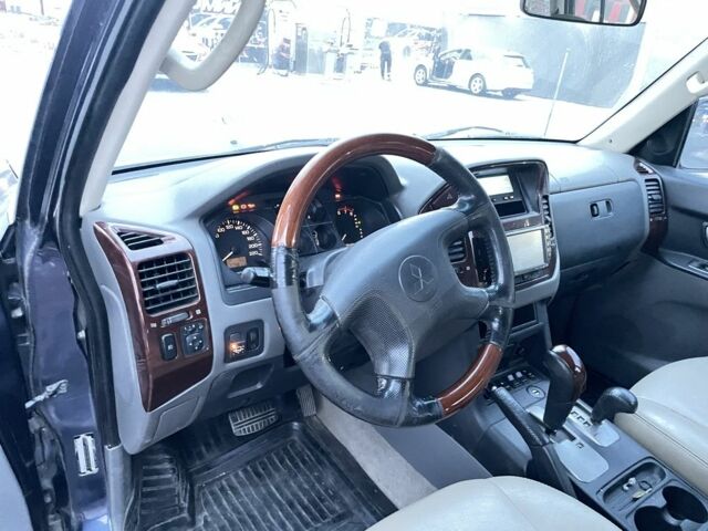 Синий Мицубиси Паджеро, объемом двигателя 3 л и пробегом 180 тыс. км за 6500 $, фото 13 на Automoto.ua