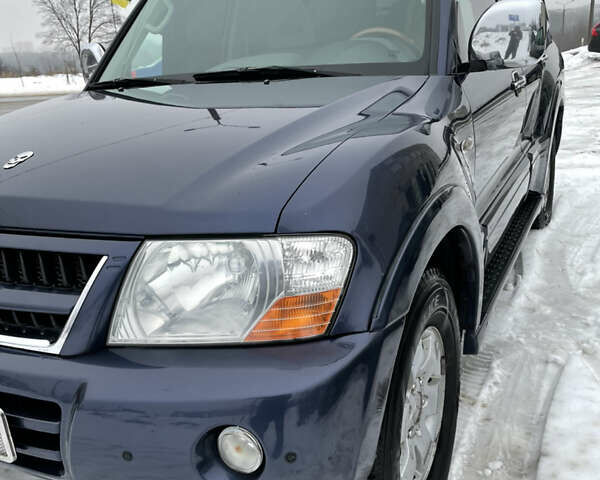 Синій Міцубісі Паджеро, об'ємом двигуна 3 л та пробігом 295 тис. км за 8500 $, фото 6 на Automoto.ua