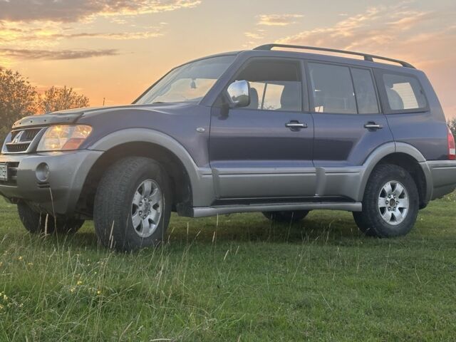 Синий Мицубиси Паджеро, объемом двигателя 3 л и пробегом 180 тыс. км за 6500 $, фото 1 на Automoto.ua