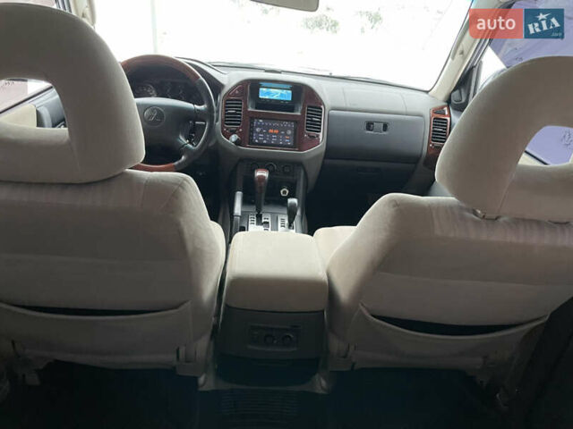 Синий Мицубиси Паджеро, объемом двигателя 3 л и пробегом 295 тыс. км за 7600 $, фото 33 на Automoto.ua