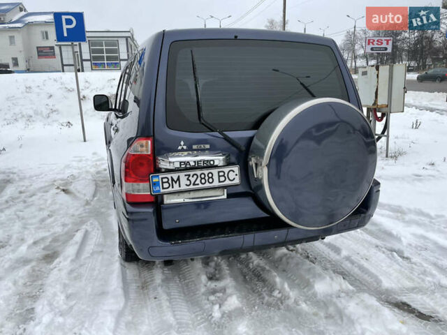Синій Міцубісі Паджеро, об'ємом двигуна 3 л та пробігом 295 тис. км за 8500 $, фото 3 на Automoto.ua