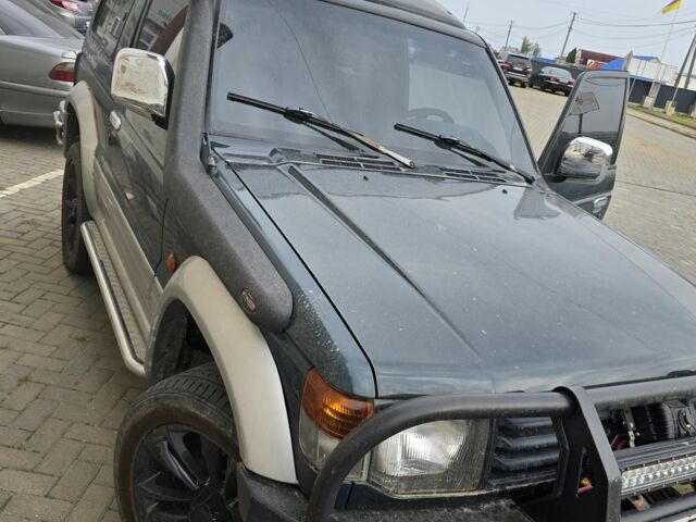 Зелений Міцубісі Паджеро, об'ємом двигуна 3 л та пробігом 280 тис. км за 5500 $, фото 7 на Automoto.ua