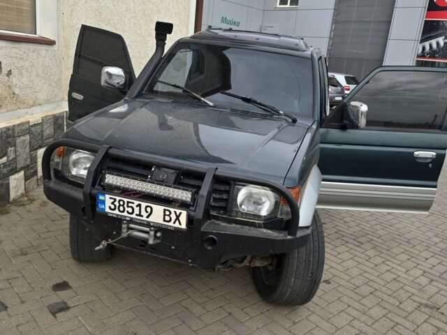 Зелений Міцубісі Паджеро, об'ємом двигуна 3 л та пробігом 280 тис. км за 5500 $, фото 1 на Automoto.ua