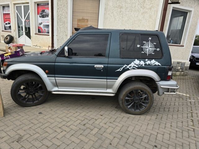 Зелений Міцубісі Паджеро, об'ємом двигуна 3 л та пробігом 280 тис. км за 5500 $, фото 5 на Automoto.ua