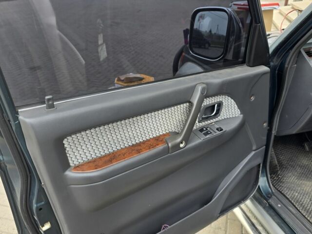 Зелений Міцубісі Паджеро, об'ємом двигуна 3 л та пробігом 280 тис. км за 5500 $, фото 8 на Automoto.ua