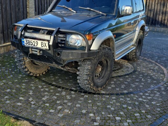 Зелений Міцубісі Паджеро, об'ємом двигуна 3 л та пробігом 280 тис. км за 5500 $, фото 9 на Automoto.ua