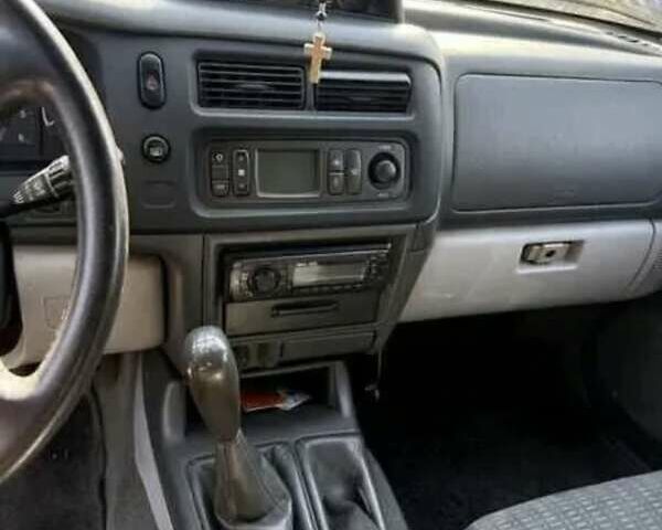 Зеленый Мицубиси Паджеро, объемом двигателя 3.2 л и пробегом 230 тыс. км за 4000 $, фото 7 на Automoto.ua