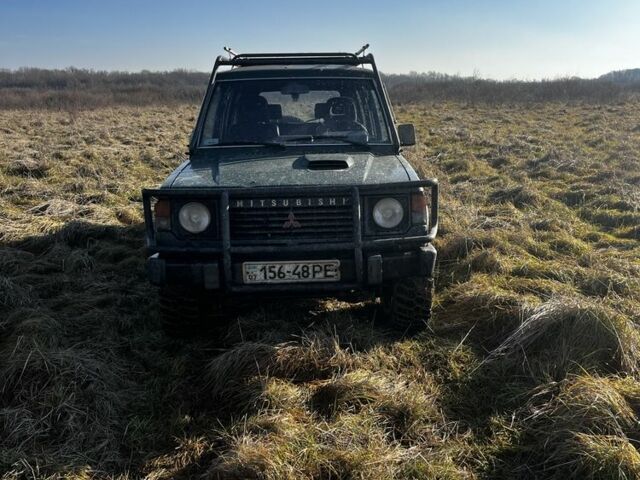 Зеленый Мицубиси Паджеро, объемом двигателя 2.5 л и пробегом 350 тыс. км за 3900 $, фото 1 на Automoto.ua