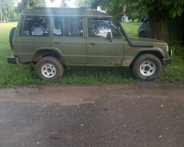 Зеленый Мицубиси Паджеро, объемом двигателя 2.5 л и пробегом 300 тыс. км за 4500 $, фото 2 на Automoto.ua