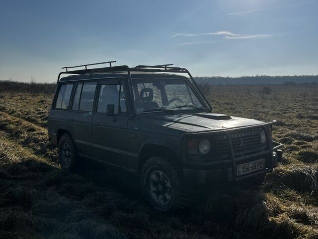 Зеленый Мицубиси Паджеро, объемом двигателя 2.5 л и пробегом 350 тыс. км за 4400 $, фото 2 на Automoto.ua